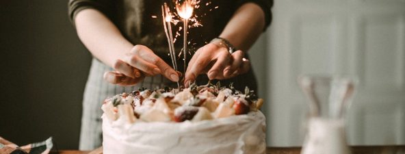 The reason behind cutting a cake and blowing candles